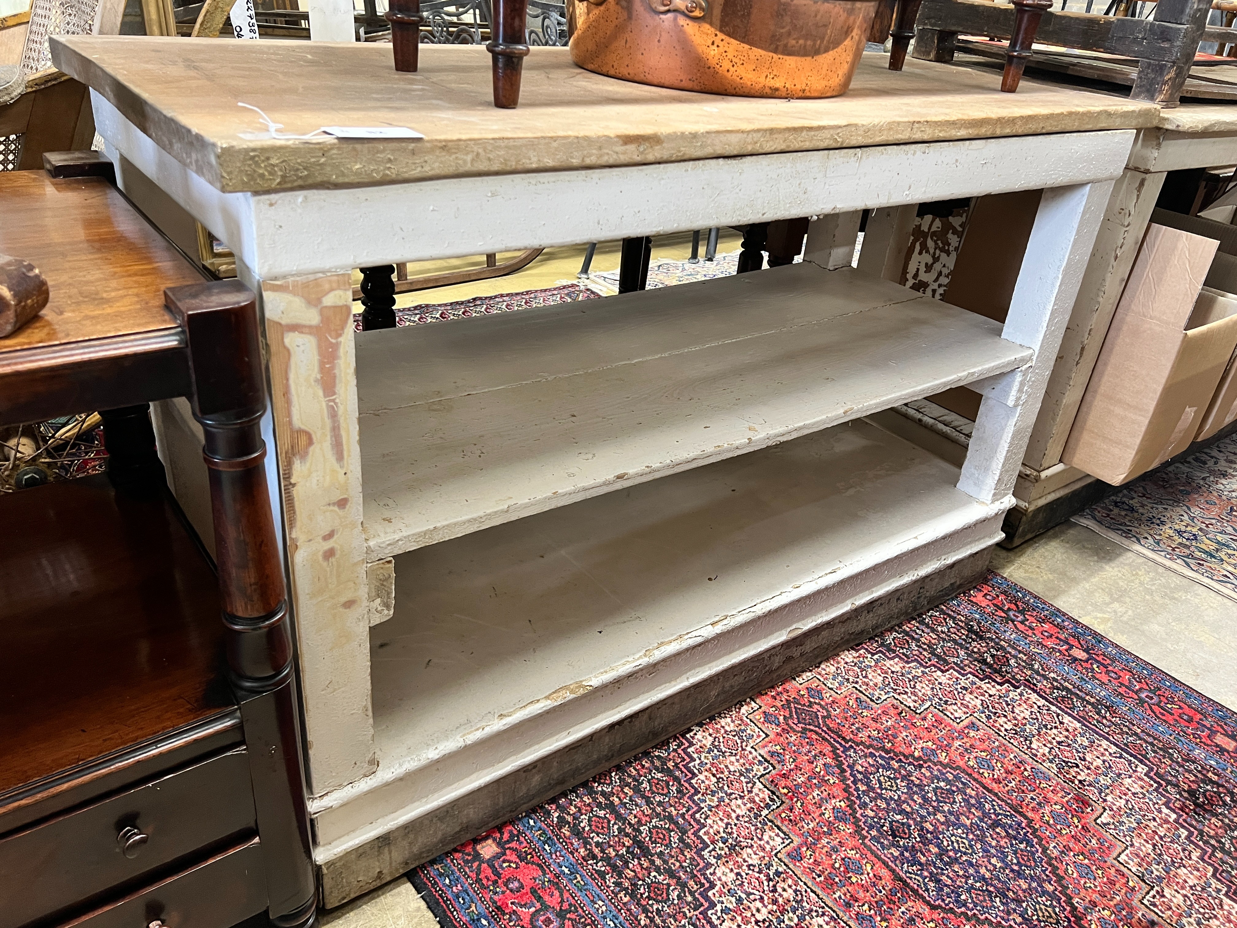 A Victorian painted three tier kitchen serving table, length 140cm, depth 59cm, height 88cm